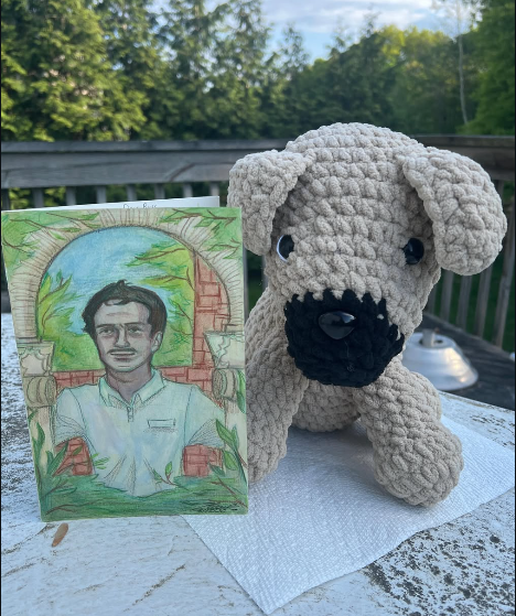 C2R at USC supported their designated senior by providing this portrait and crocheted dog.